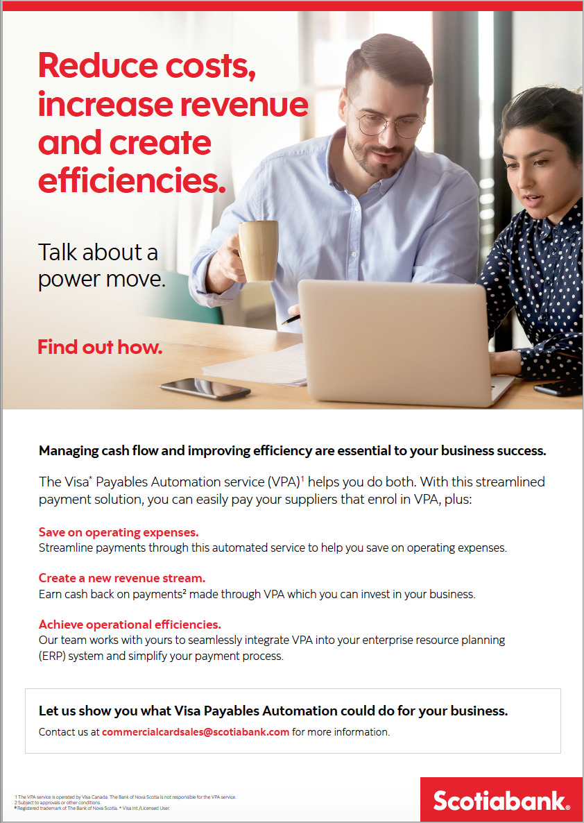 Woman and man look at laptop